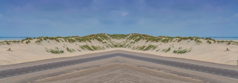 Panorama of a sunny natural landscape with great sand dunes in the Netherlands.