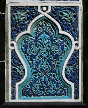Old Eastern mosaic on the wall of a mosque, Uzbekistan