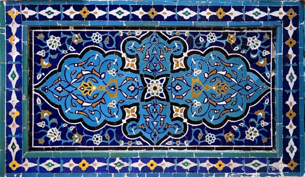 Old Eastern mosaic on the wall of a mosque, Uzbekistan