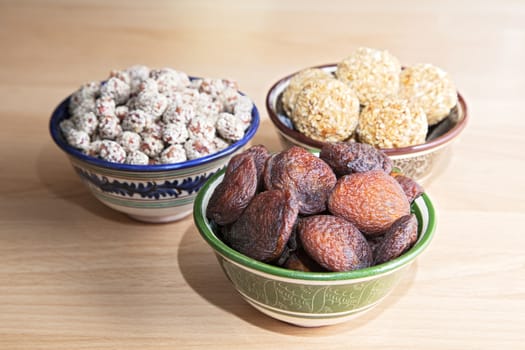 Oriental sweets in bowls on a table
