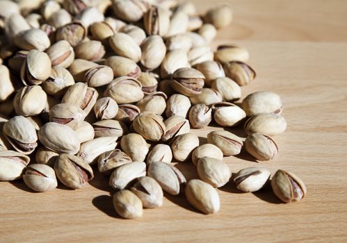 Close up of fresh pistashio nuts, background