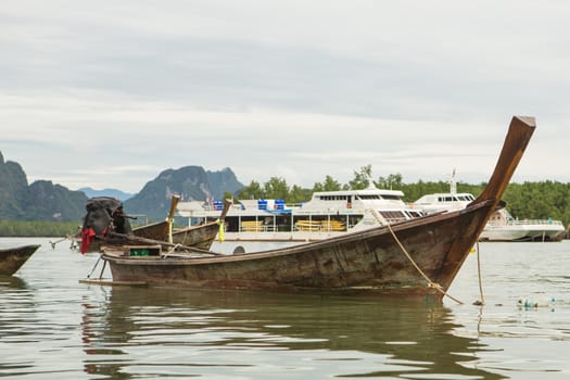 old fishing boat in the sea in Thailand.