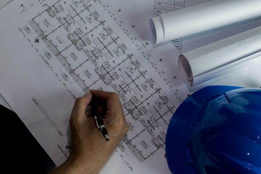 Workplace of architect - Architect rolls and plans.architectural plan,technical project drawing. Engineering tools view from the top. Construction background