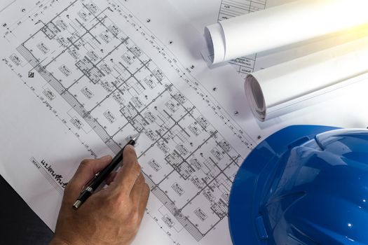 Workplace of architect - Architect rolls and plans.architectural plan,technical project drawing. Engineering tools view from the top. Construction background.