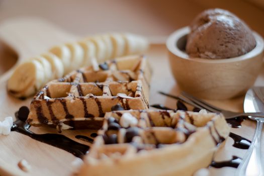 delicious sweet dessert : homemade waffle with chocolate sauce ,selective focus