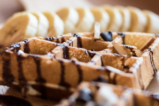 delicious sweet dessert : homemade waffle with chocolate sauce ,selective focus