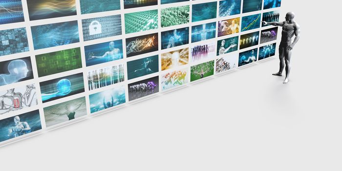 Man Pointing at a Video Wall Filled with Screens