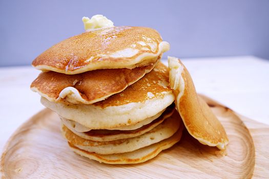 Pancakes in dish on Table wood