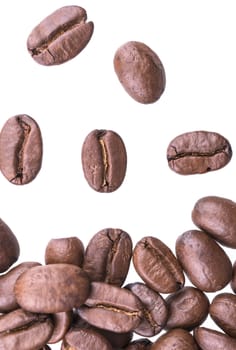 Closeup of coffee beans isolated on white background.