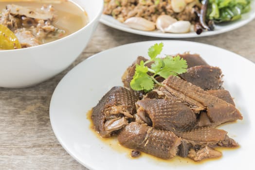 Pot-stewed duck cooked Chinese Herbal in dish.