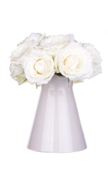 Roses in a vase isolated on white background.