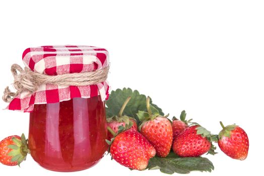 Strawberry jam in a glass bottle. Isolated on white background