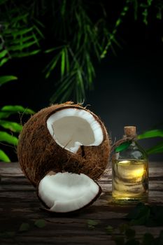 Close up view of nice fresh coconut on green leaf background