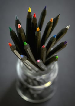 Colored  black pencils in jar