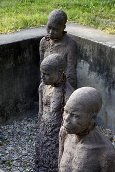 A statue in Stone Town. Zanzibar dipicting and mourning the African slave trade