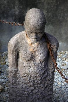 A statue in Stone Town. Zanzibar dipicting and mourning the African slave trade