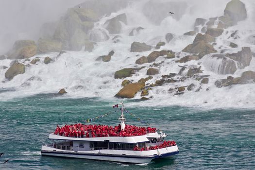 Beautiful photo of a ship near amazing Niagara waterfall