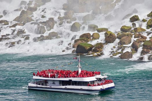 Beautiful photo of a ship near amazing Niagara waterfall