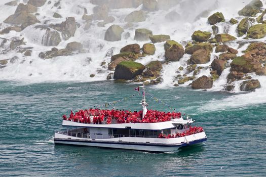 Beautiful photo of a ship near amazing Niagara waterfall