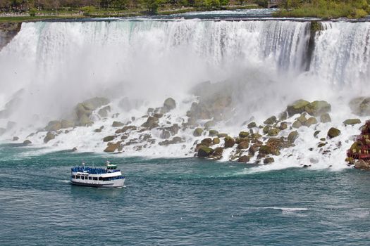 Beautiful photo of a ship near amazing Niagara waterfall