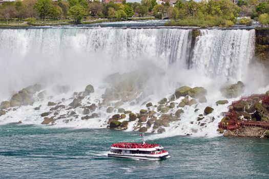 Beautiful photo of a ship near amazing Niagara waterfall