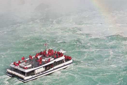 Beautiful photo of a ship near amazing Niagara waterfall