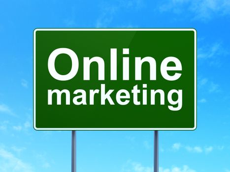 Marketing concept: Online Marketing on green road highway sign, clear blue sky background, 3D rendering