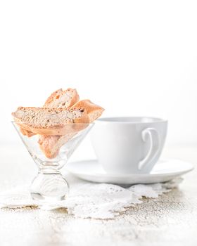 Delicious almond biscotti served with a cup of coffee.