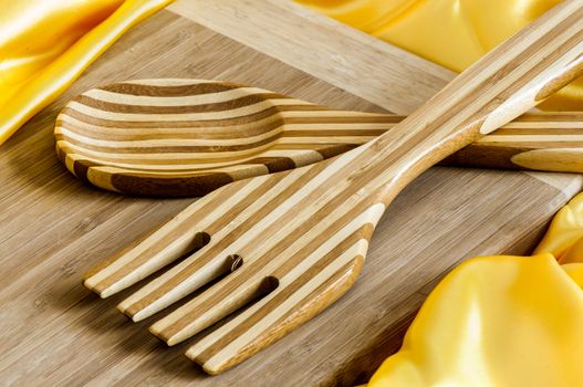 cutting board and utensils in bamboo wood