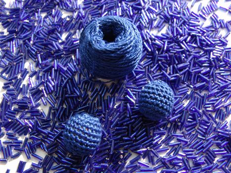 Blue beads and blue yarn