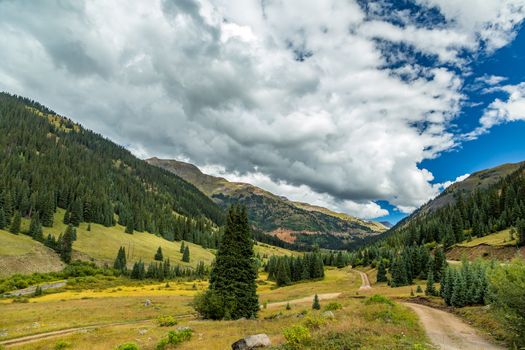 The San Juan Skyway forms a 233 mile loop in southwest Colorado traversing the heart of the San Juan Mountains festuring breathtaking mountain views and includes the portion of US 550 between Silverton and Ouray known as the Million Dollar Highway.