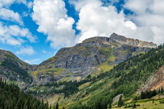 The San Juan Skyway forms a 233 mile loop in southwest Colorado traversing the heart of the San Juan Mountains festuring breathtaking mountain views and includes the portion of US 550 between Silverton and Ouray known as the Million Dollar Highway.