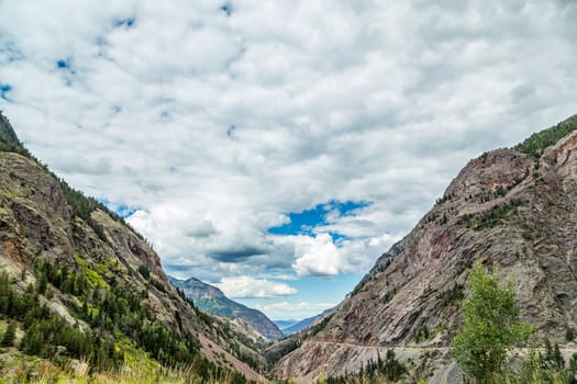 The San Juan Skyway forms a 233 mile loop in southwest Colorado traversing the heart of the San Juan Mountains festuring breathtaking mountain views and includes the portion of US 550 between Silverton and Ouray known as the Million Dollar Highway.