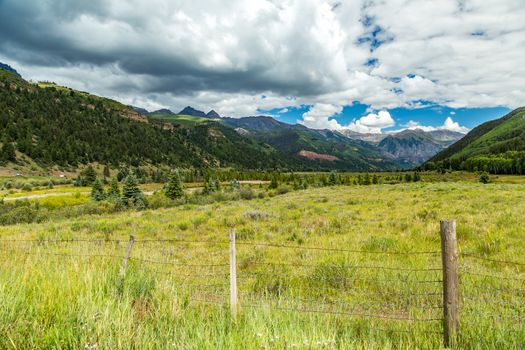 The San Juan Skyway forms a 233 mile loop in southwest Colorado traversing the heart of the San Juan Mountains festuring breathtaking mountain views and includes the portion of US 550 between Silverton and Ouray known as the Million Dollar Highway.