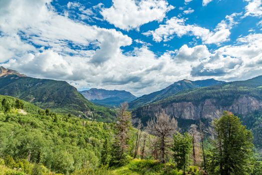 The San Juan Skyway forms a 233 mile loop in southwest Colorado traversing the heart of the San Juan Mountains festuring breathtaking mountain views and includes the portion of US 550 between Silverton and Ouray known as the Million Dollar Highway.