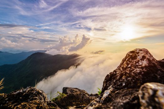 Beautiful landscape nature of high mountain colourful sunlight cloud and sky on Phi Pan Nam Range during sunset in winter from viewpoint Phu Chi Fa Forest Park at Chiang Rai Province Thailand