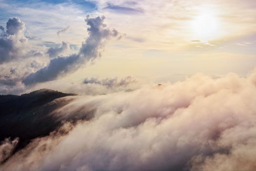 Beautiful landscape nature of high mountain colourful sunlight cloud and sky on Phi Pan Nam Range during sunset in winter from viewpoint Phu Chi Fa Forest Park at Chiang Rai Province Thailand