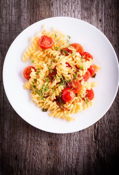 Fussili pasta with watercress and cherry tomatoes