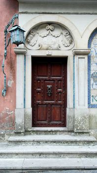 Detail of an old decorated wood door