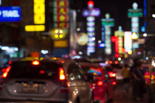 Blurred unfocused city view at night in Thailand