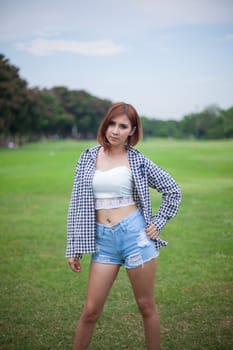 Portrait of beautiful asian woman in the park