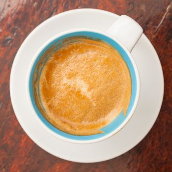 white cup coffee on table background