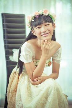 Portrait of a beautiful asian girl with flower crown
