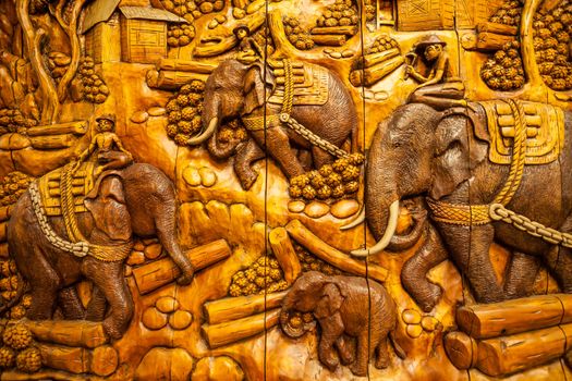 Carved Thai animals on the wood
