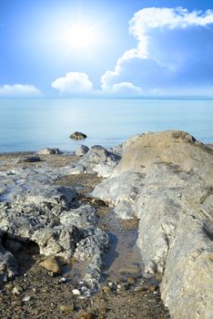 beautiful soft waves break on the rocks at ballybunion beach in ireland