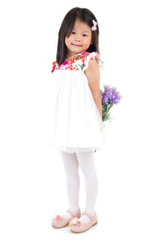 Cute asian girl posing with flowers isolated on white.