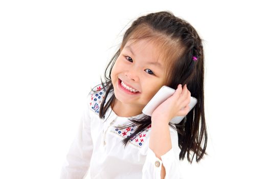 Little asian girl talking with smartphone