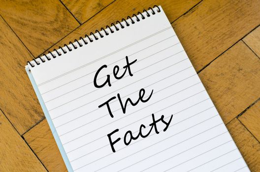 Get the facts text concept write on notebook