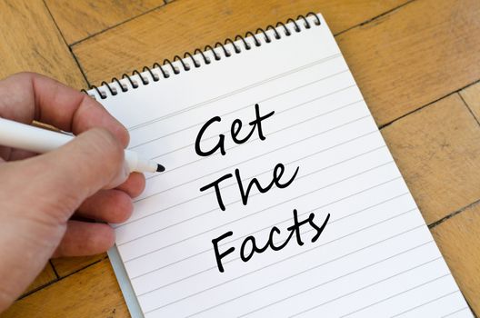 Get the facts text concept write on notebook