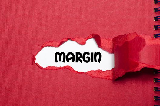 The word margin appearing behind torn paper